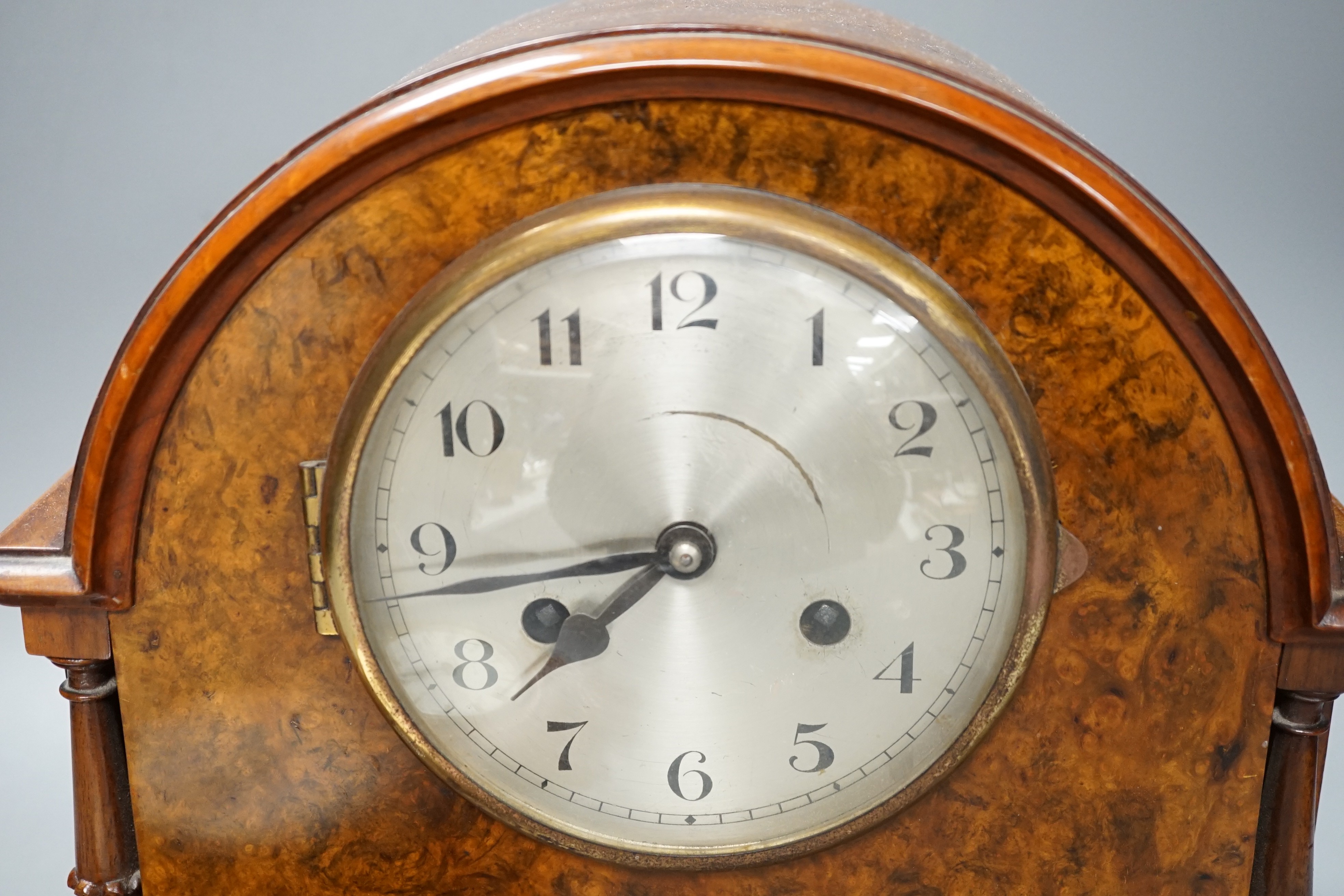 A Victorian carved oak wall timepiece and a burr walnut mantel clock